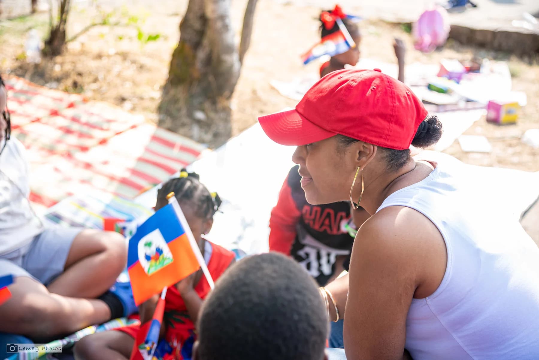 Haitian mentor and young adult in a community center